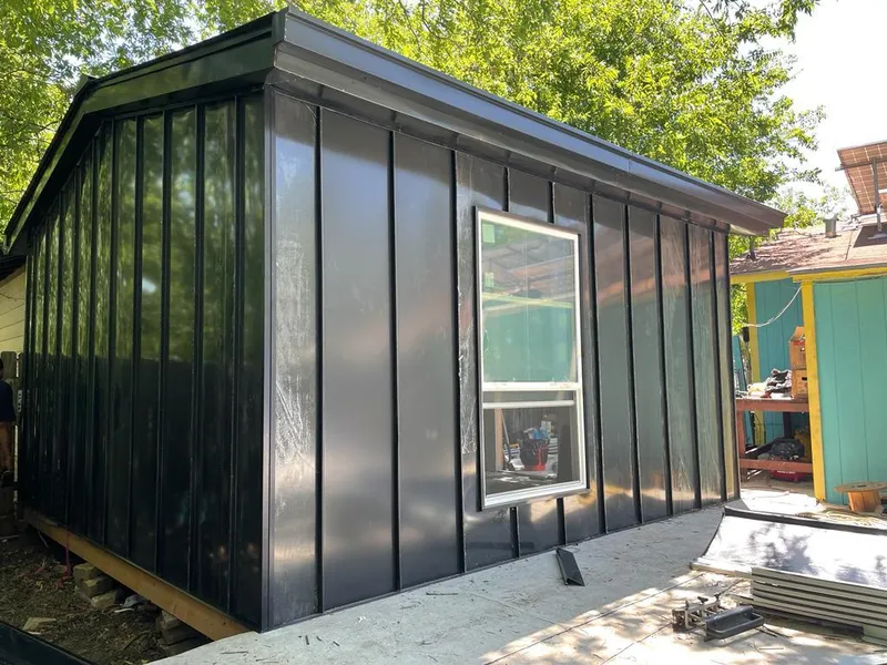 Black standing seam metal wall panels for Roof Inspection in Land O' Lakes