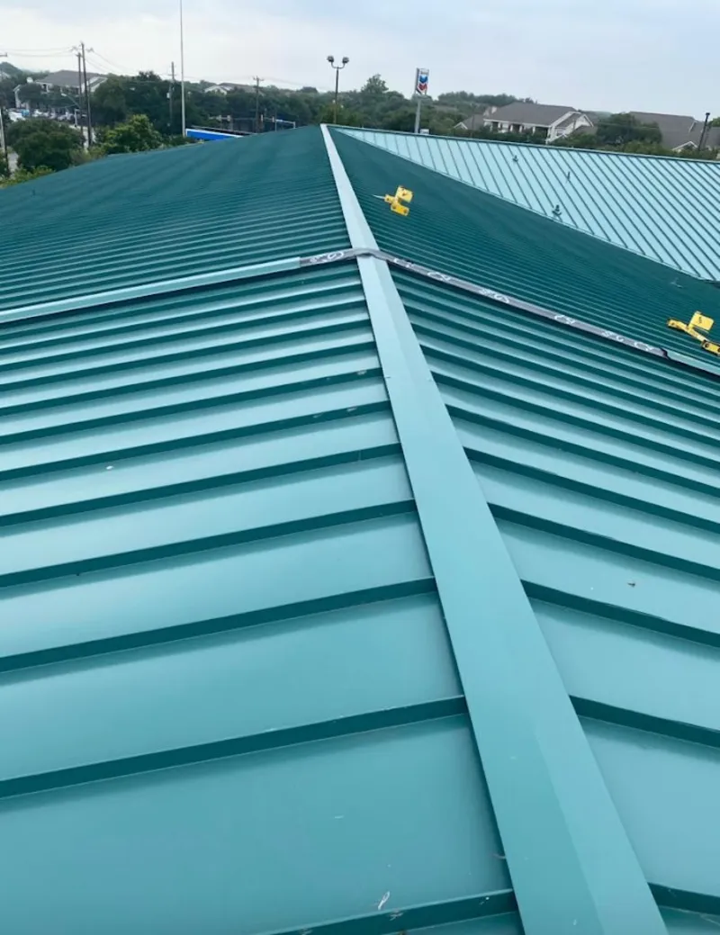 Green commercial metal roof ridge and valley for Metal Roof Repair in Land O' Lakes